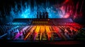Colorful Audio Spectrum Display over Sound Mixer Console in a Dark Recording Studio Royalty Free Stock Photo