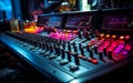 Colorful Audio Spectrum Display over Sound Mixer Console in a Dark Recording Studio Royalty Free Stock Photo