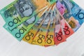 Colorful australian dollars laying on wooden table Royalty Free Stock Photo