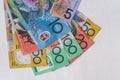 Colorful australian dollars laying on wooden table Royalty Free Stock Photo