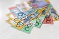 Colorful australian dollars laying on wooden table Royalty Free Stock Photo