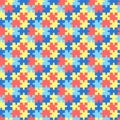 Colorful autism pattern with puzzles pieces. Seamless background with yellow, blue and red puzzles. World Autism Awareness Day