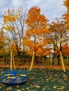 Colorful autumn on a playground Royalty Free Stock Photo