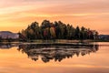 Colorful autumn evening reflecting in lake. Colourful autumn sunset in mountain lake Royalty Free Stock Photo