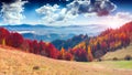 Colorful autumn landscape in the mountain village. Foggy morning Royalty Free Stock Photo