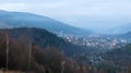 Colorful autumn landscape in a mountain village. Misty morning in the Carpathians. Ukraine, Europe. Beautiful hills and houses. Royalty Free Stock Photo