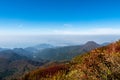 Colorful autumn landscape of Unzen mountains and Unzen Amakusa National Park from Uznen Nita Pass hiking trail, Japan Royalty Free Stock Photo
