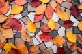 colorful autumn leaves on a tiled floor