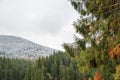 Colorful autumn in the mountains. First snow in october