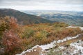 Colorful autumn in the mountains. First snow in october