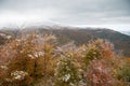 Colorful autumn in the mountains. First snow in october