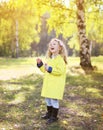 Colorful autumn photo, little child having fun