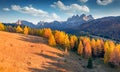 Colorful autumn scene of Fuchiade valley. Captivating evening view of Dolomite Alps, Italy, Europe