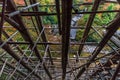 Colorful autumn scene throug wooden scaffolding for restoration works at Kiyomizu-dera Buddhist Temple. Kyoto, Japan Royalty Free Stock Photo