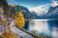 Colorful autumn scene of Vorderer Gosausee lake. Picturesque morning view of Austrian Alps, Upper Austria, Europe. Traveling