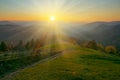 Colorful autumn and scenic sunrise in the Carpathian mountains Royalty Free Stock Photo