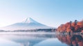 Colorful Autumn Season and Mountain Fuji with morning fog and red leaves at lake Kawaguchiko is one of the best places in Japan Royalty Free Stock Photo