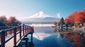 Colorful Autumn Season and Mountain Fuji with morning fog and red leaves at lake Kawaguchiko is one of the best places in Japan Royalty Free Stock Photo