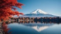 Colorful Autumn Season and Mountain Fuji with morning fog and red leaves at lake Kawaguchiko is one of the best places in Japan Royalty Free Stock Photo