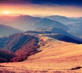 Colorful autumn sunrise in Carpathian mountains. Royalty Free Stock Photo