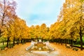 Colorful Autumn trees arround Vater Rhein fountain in Munich