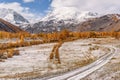 Mountains road snow autumn trees Royalty Free Stock Photo