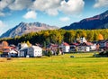 Colorful autumn view of Monteplair village, Resia lake location, Itay, Europe. Sunny morning scene of Italian Alps. Traveling conc Royalty Free Stock Photo