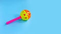 Colorful baby rattle on blue background Royalty Free Stock Photo