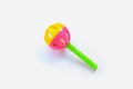 Colorful baby rattle on white background. Royalty Free Stock Photo