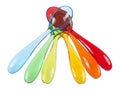 Colorful baby spoon set on white background