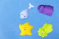 Colorful baby toys on a blue background