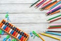 Colorful back to school supplies double border over white table. Mental arithmetic. Space for text. Royalty Free Stock Photo