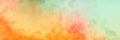 Colorful background in blue orange yellow and red watercolor painted design, grunge texture in soft pastel colors of sunset sky Royalty Free Stock Photo