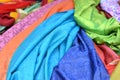 Background of bright silk cloths at Indian Market - blue, green