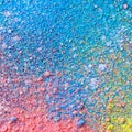 Multicolored dust particles splattered on black background Royalty Free Stock Photo