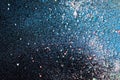 Multicolored dust particles splattered on black background Royalty Free Stock Photo