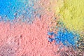 Colorful background of chalk powder. Multicolored dust particles splattered on black background Royalty Free Stock Photo