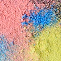 Colorful background of chalk powder. Multicolored dust particles splattered on black background Royalty Free Stock Photo