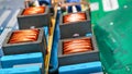 Close-up of copper coils and circuit boards for laptop mainboards