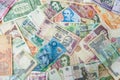 Colorful background made of used international money bills Royalty Free Stock Photo