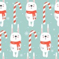Colorful seamless pattern with rabbits, candy canes, snow. Decorative cute background with animals. Happy New Year Royalty Free Stock Photo