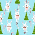 Colorful background with rabbits, fir trees, candy canes. Decorative cute backdrop vector. Happy New Year, seamless pattern with Royalty Free Stock Photo