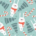 Colorful seamless pattern with rabbits, fir trees, candy canes, snow. Decorative cute background with animals. Happy New Year Royalty Free Stock Photo