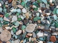 Colorful background of sea pebbles and colored with colored bits of glas Royalty Free Stock Photo