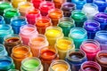 Paint bottles. A background of bottles containing paints of different colors Royalty Free Stock Photo