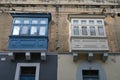 Colorful balconies on a building inside the old town of Rabat in Malta Royalty Free Stock Photo