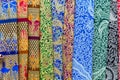 Colorful balinese cloth for sale, Abstract fabric texture background.