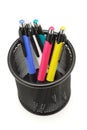 Colorful ball point pens in black container