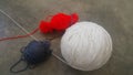 Colorful ball of threads wool yarn for knitting on grey floor background Royalty Free Stock Photo