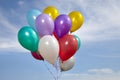 Colorful ballons in a blue sky Royalty Free Stock Photo